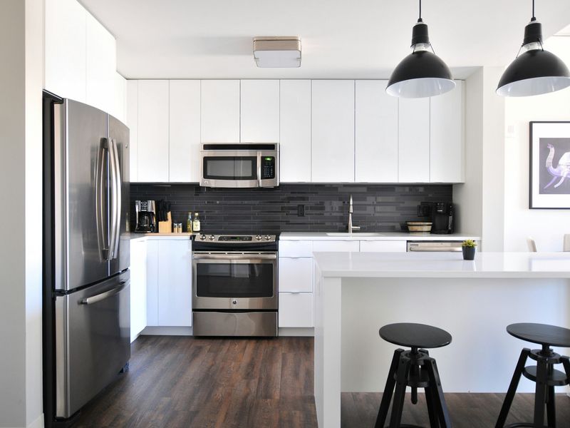 Clean, minimalist white kitchen